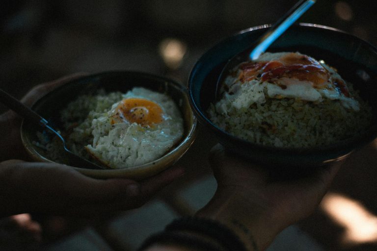 Asian-inspired egg bowl with rice, vegetables, and soy-ginger sauce