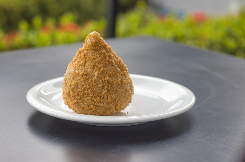 Crispy Brazilian chicken coxinha croquettes served golden brown on a plate