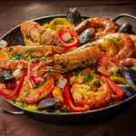 Spanish seafood paella in the pan